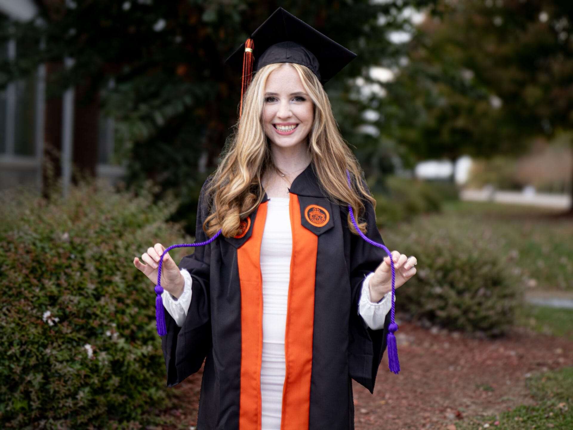 Woman in a graduation cap and gown