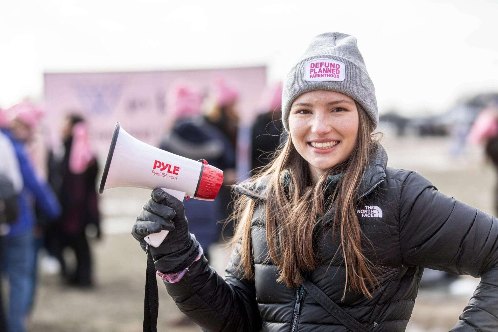 Young woman activist hold megaphone at 2024 March for Life